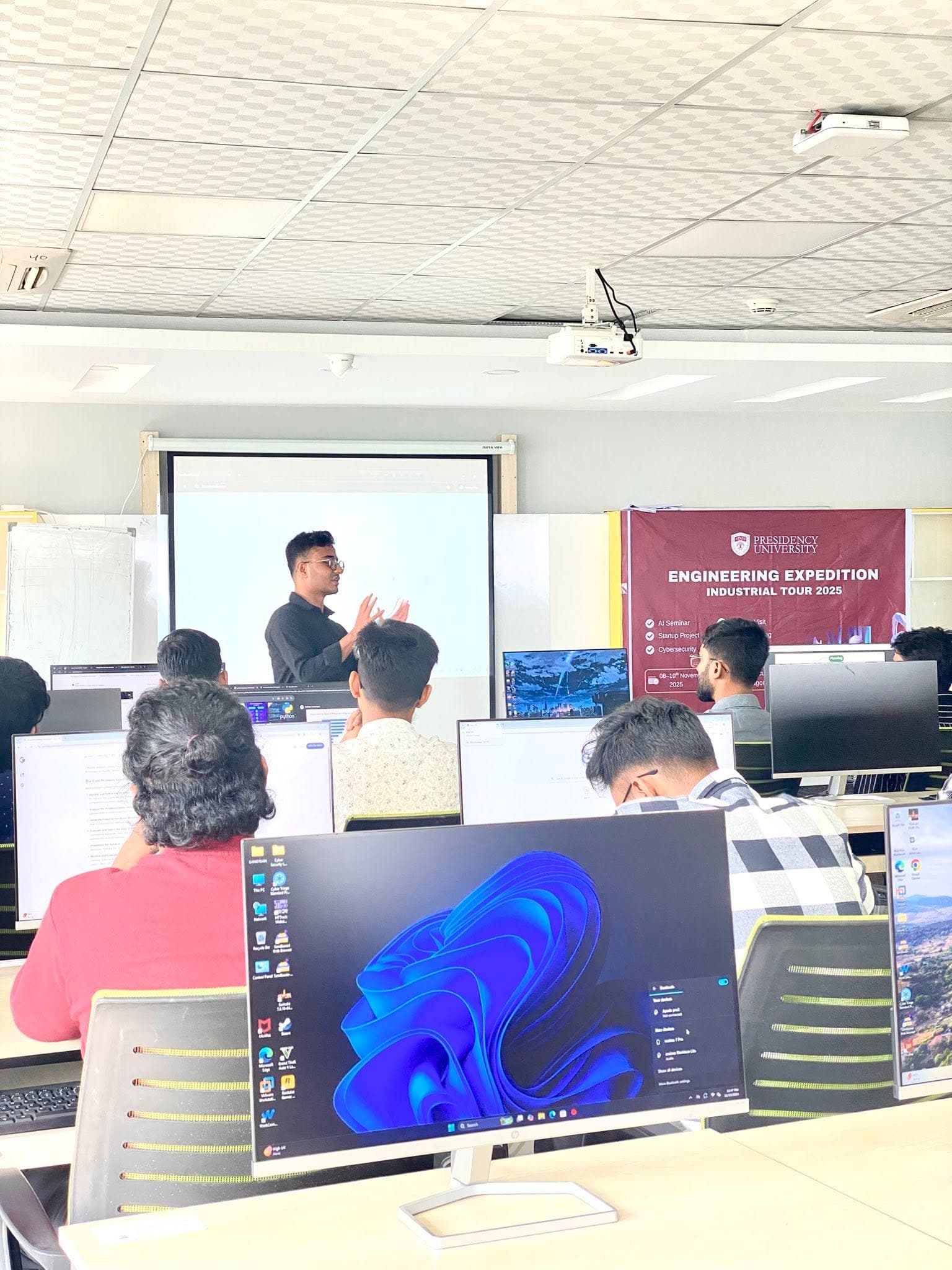 Abdullah Al Sobail presenting during the How to Build a Website in a Day session at Presidency University's Engineering Expedition Industrial Tour, hosted at IT Business Incubator, CUET